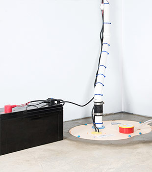 A sump pump installed in Dansville by Halco Basement Systems