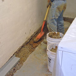 Digging a trench for a French Drain system in Geneva