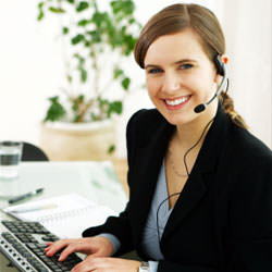A disaster restoration customer service expert in Walworth manning the phones