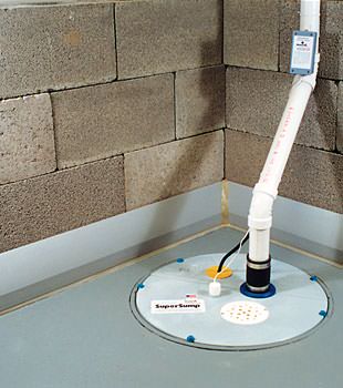 A baseboard basement drain pipe system installed in Penn Yan