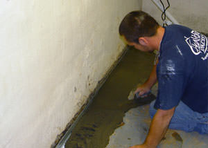 Restoring a concrete slab floor in The Greater Finger Lakes Area.
