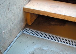 a hatchway entrance in Palmyra that has been protected from flooding by our TrenchDrain basement drainage system.