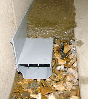 A basement drain system installed in a Newark home