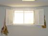 Windows and covered window wells for homes in 